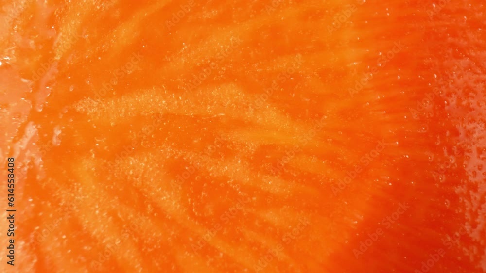 Mesmerizing macro video captures the intricate details of a carrot slice using a probe lens. Explore the vibrant colors and fascinating textures in this stunning close-up footage. Vegetable concept
Mesmerizing macro video captures the intricate details of a carrot slice using a probe lens. Explore the vibrant colors and fascinating textures in this stunning close-up footage. Vegetable concept
