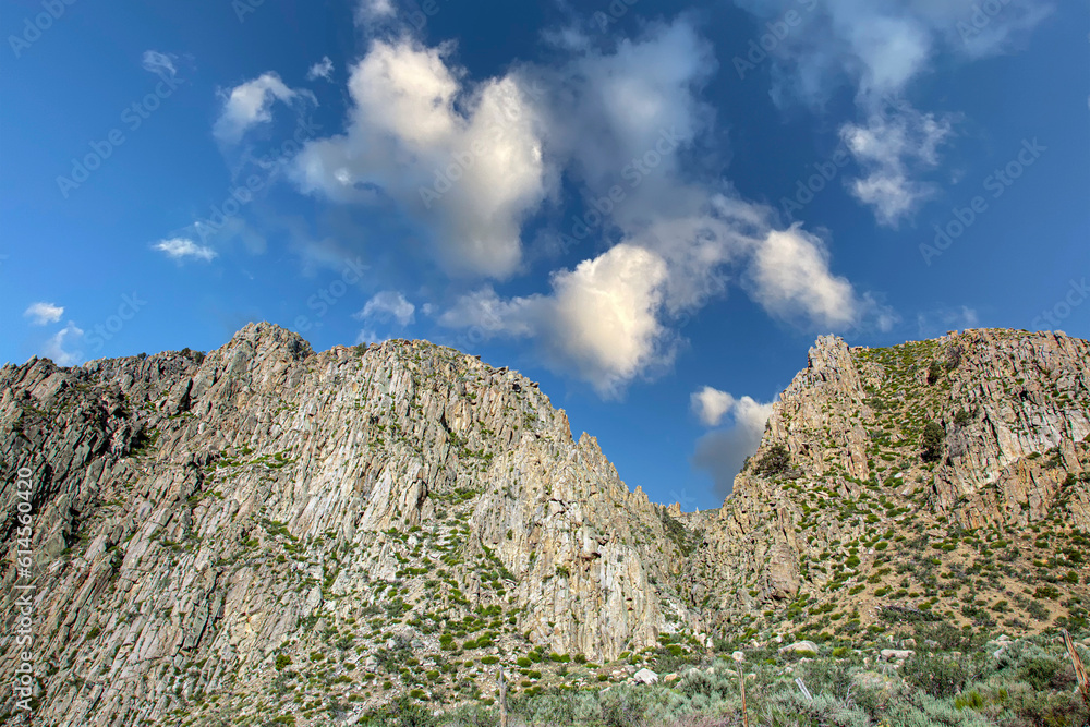 Naklejka premium Cliff and Clouds