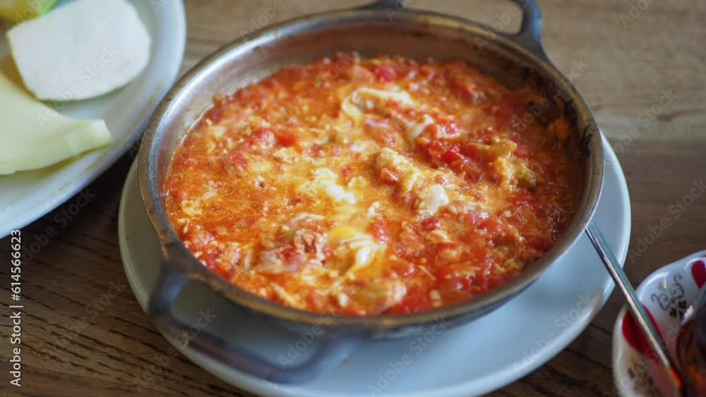 Turkish Menemen omelet in a frying pan. . Turkish Menemen omelet in a frying pan. .
