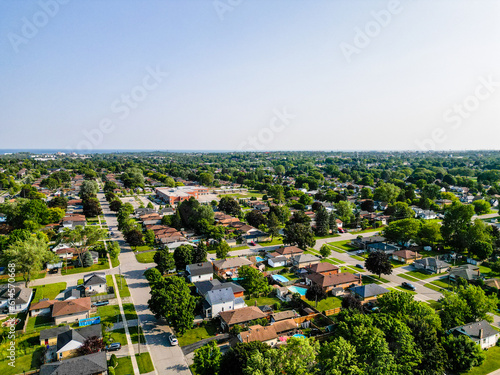 Explore Oshawa, Ontario with stunning drone photography. Capture striking aerial views of Lake Ontario, Lakeview Park, and Highway 400. Highlight Durham's real estate market, featuring exquisite homes