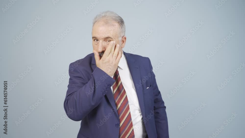 Businessman with wrinkles on his skin is annoyed. Businessman with wrinkles on his skin is annoyed.