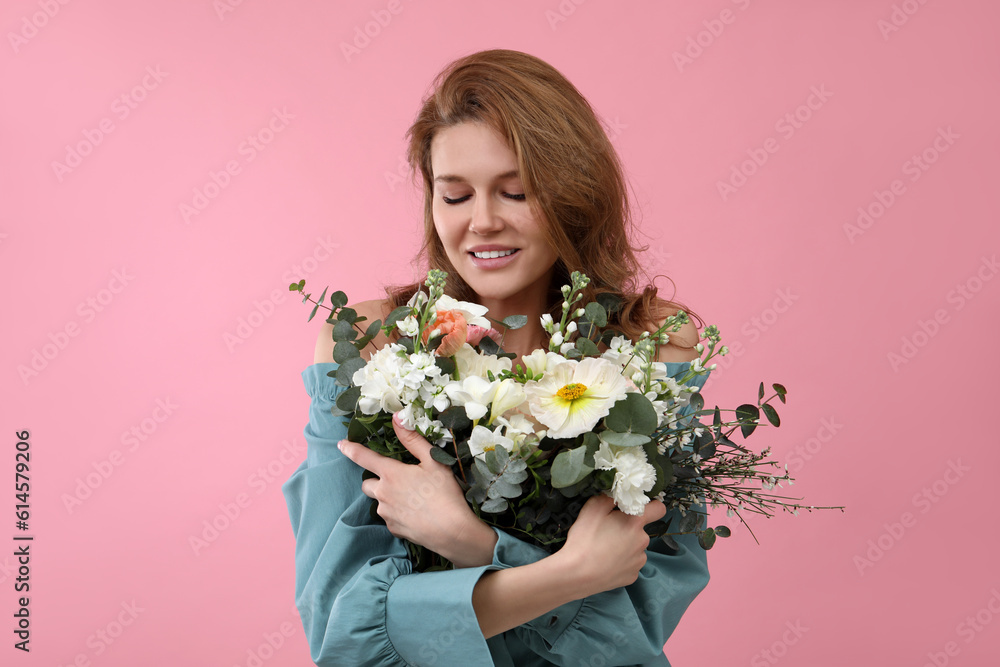 Beautiful woman with bouquet of flowers on pink background Beautiful woman with bouquet of flowers on pink background