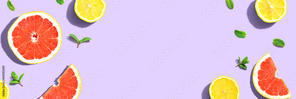 Fresh grapefruits and lemons overhead view - flat lay Fresh grapefruits and lemons overhead view - flat lay