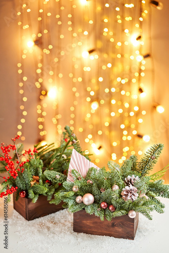 Two christmas wooden box with fir branches for the holiday. The new year celebration. European flower shop