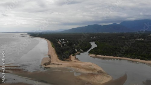 drone aerial panorama of Balgal Beach - little town with pristine paradise beach and two little rivers with magroves; unique coast near townsville in tropical north queensland, australia photo