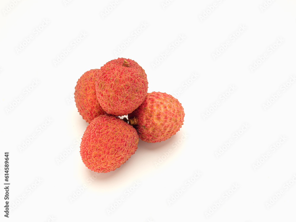 Fresh ripe lychees on a white background. Fresh ripe lychees on a white background.