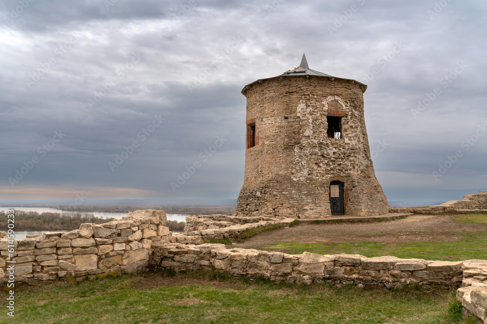 View of the remains of a fortified settlement on the bank of the Kama River - a white stone tower on the Yelabuga (Devil's) settlement on a summer day, Yelabuga, Republic of Tatarstan, Russia