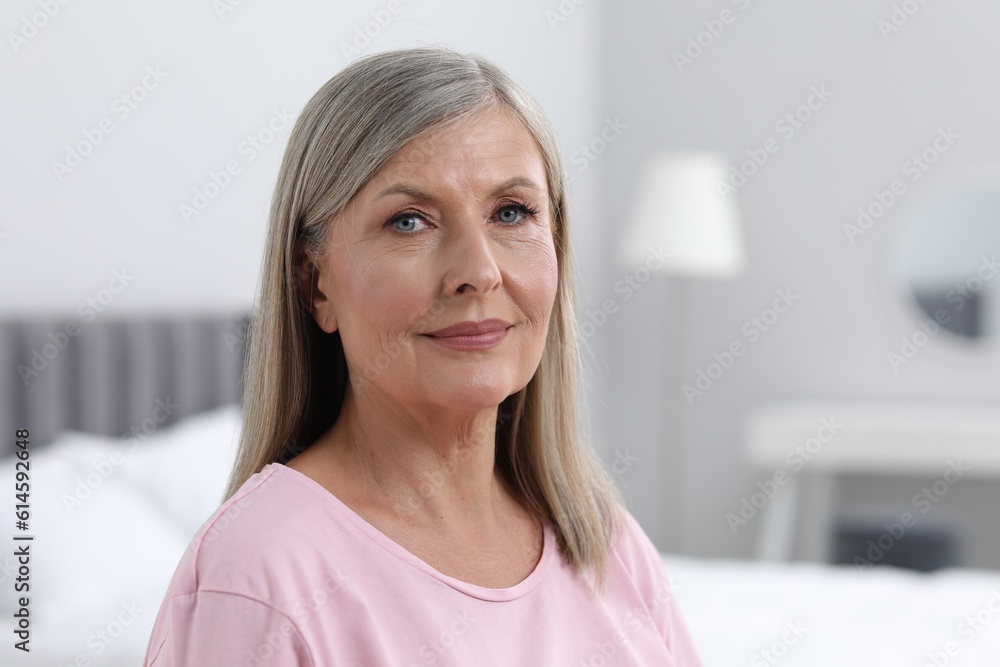 Portrait of beautiful senior woman at home. Space for text Portrait of beautiful senior woman at home. Space for text