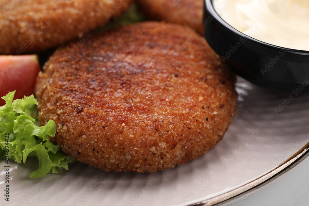 Delicious vegan cutlets on plate, closeup view Delicious vegan cutlets on plate, closeup view