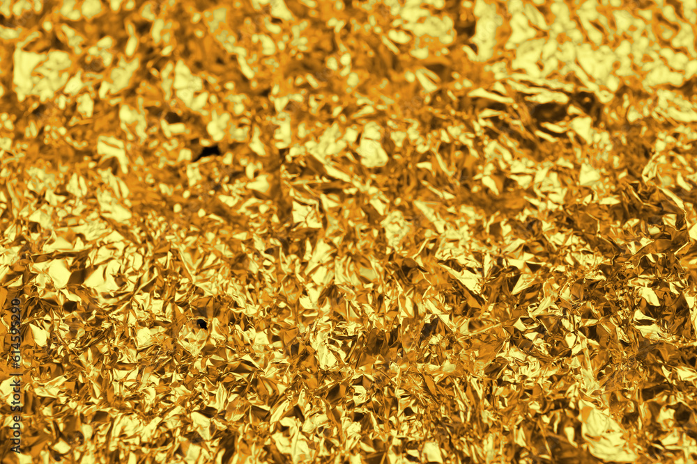 Closeup view of shiny golden surface as background Closeup view of shiny golden surface as background