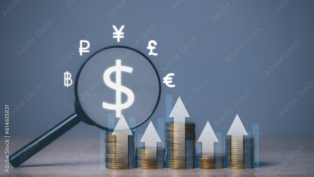 Growing stacks of coins with magnifying glass and currency icon with us dollar coins. financial investment business stock growth. Savings and compound interests concept. Growing stacks of coins with magnifying glass and currency icon with us dollar coins. financial investment business stock growth. Savings and compound interests concept.