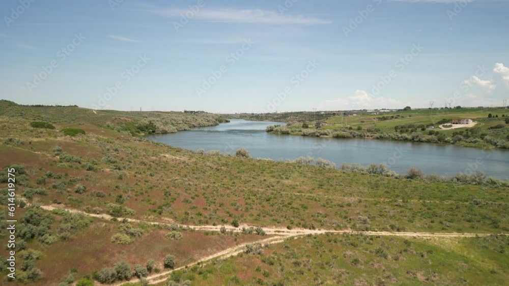 Aerial fly forward over rural part of Snake River in Burley Idaho in dry desert Aerial fly forward over rural part of Snake River in Burley Idaho in dry desert