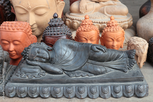 Sleeping Buddha. Handmade black clay souvenir in Bhaktapur, Nepal.