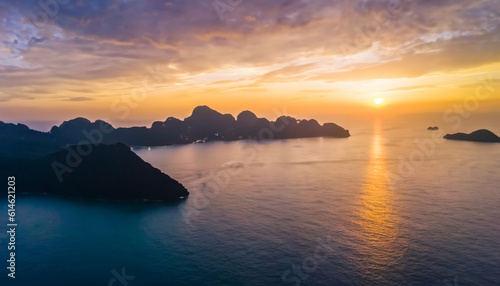 Aerial view of beautiful mountain, blue sea at colorful sunset