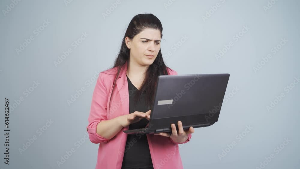 Unsuccessful business woman. She looks at the camera negatively. Unsuccessful business woman. She looks at the camera negatively.