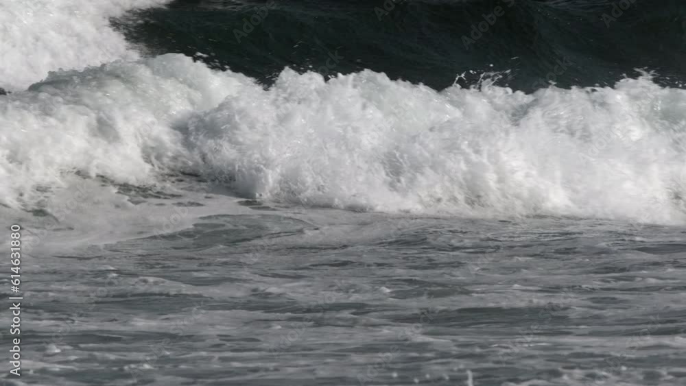 Incoming tidal waves off the south coast of Cornwall, England. Incoming tidal waves off the south coast of Cornwall, England.