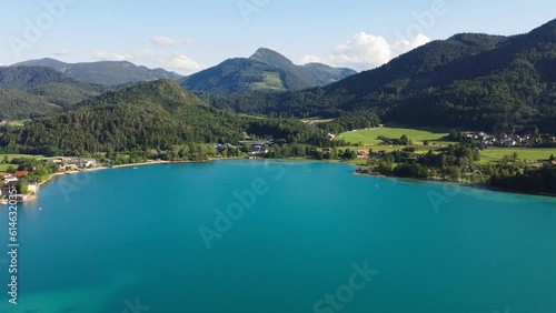 Wonderful 4k aerial of Austrian lake Fuschl am see surrounded by mountains photo