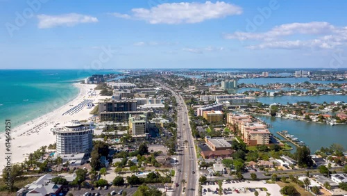 Tropical View Of The City Surrounded By Pristine Shore Of St. Pete Beach At Pinellas In Florida, United States. timelapse, aerial photo