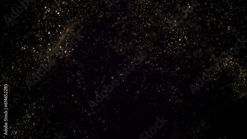 Goldem particles moving in slowm otion on black background 4k footage, Gold litters footage, particles moving footage photo