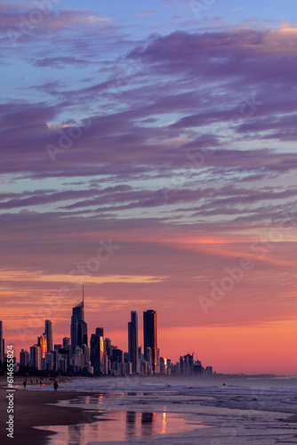 Colourful sunrise skies over Surfers Paradise skyline, view from Miami beach. Gold Coast, Australia