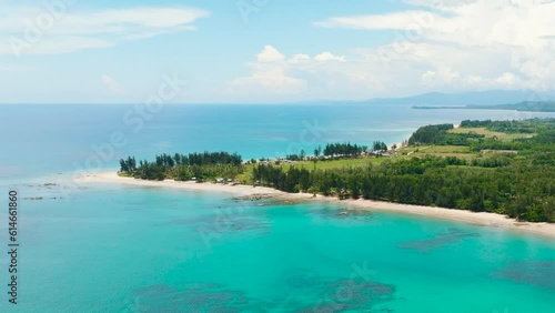 Travel concept: beautiful sandy beach and a blue ocean. Borneo, Malaysia. photo