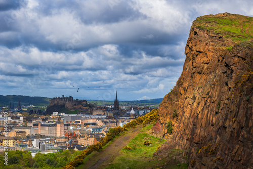 UK, Scotland, Edinburgh, View from Holyrood Park with Salisbury Crags cliff in foreground photo