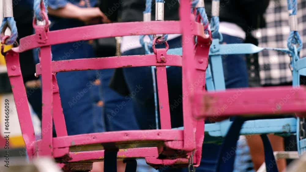 Fairground chair swing ride at fun fair Fairground chair swing ride at fun fair