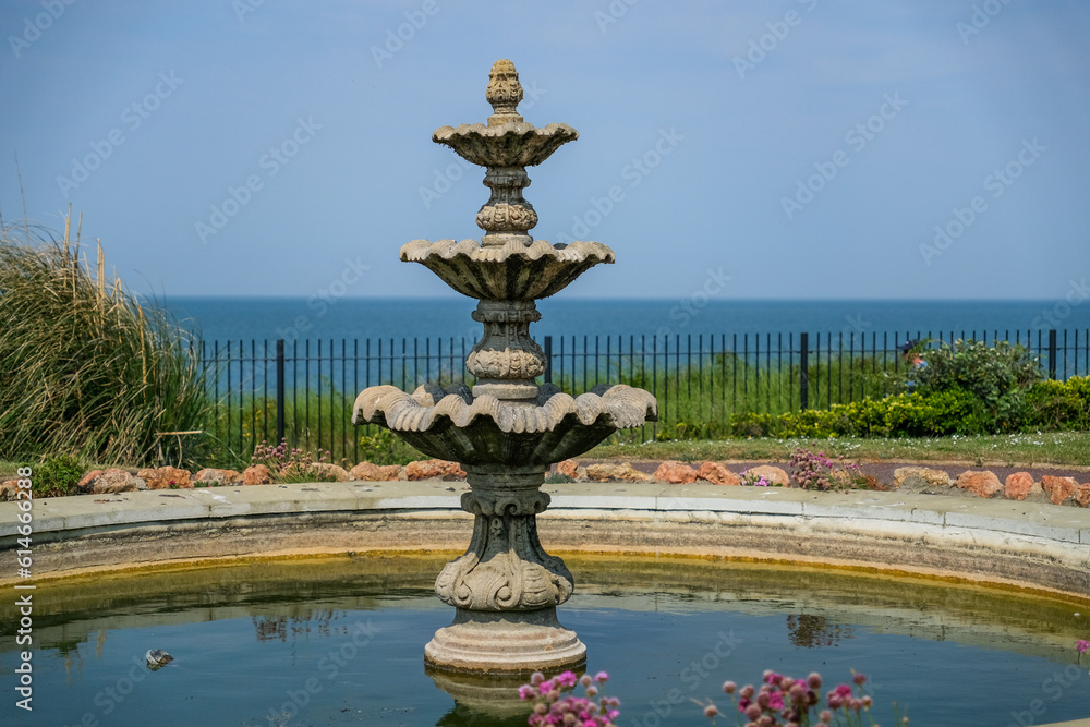 Close and selective focus on a water fountain in the clifftop gardens on Hunstanton cliff on the North Norfolk coast