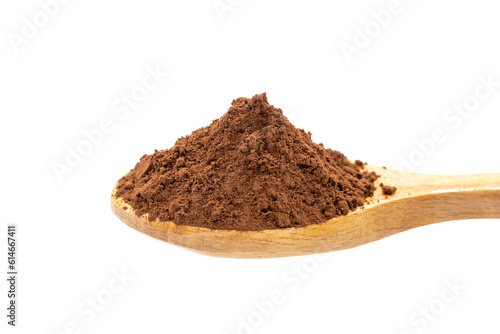 Cocoa powder on wooden spoon. Pile of Cocoa powder isolated on white background. close up