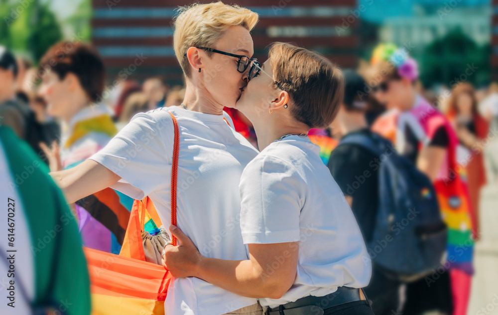 Lesbians kissing each other in gay pride event Lesbians kissing each other in gay pride event