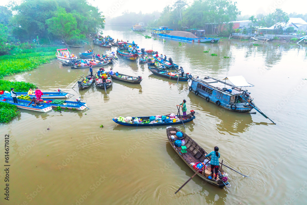 Farmers purchase crowded in Phong Dien floating market morning trade agricultural products serves traditional New Year in Can Tho, Vietnam