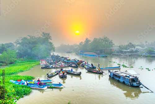 Farmers purchase crowded in Phong Dien floating market morning trade agricultural products serves traditional New Year in Can Tho, Vietnam