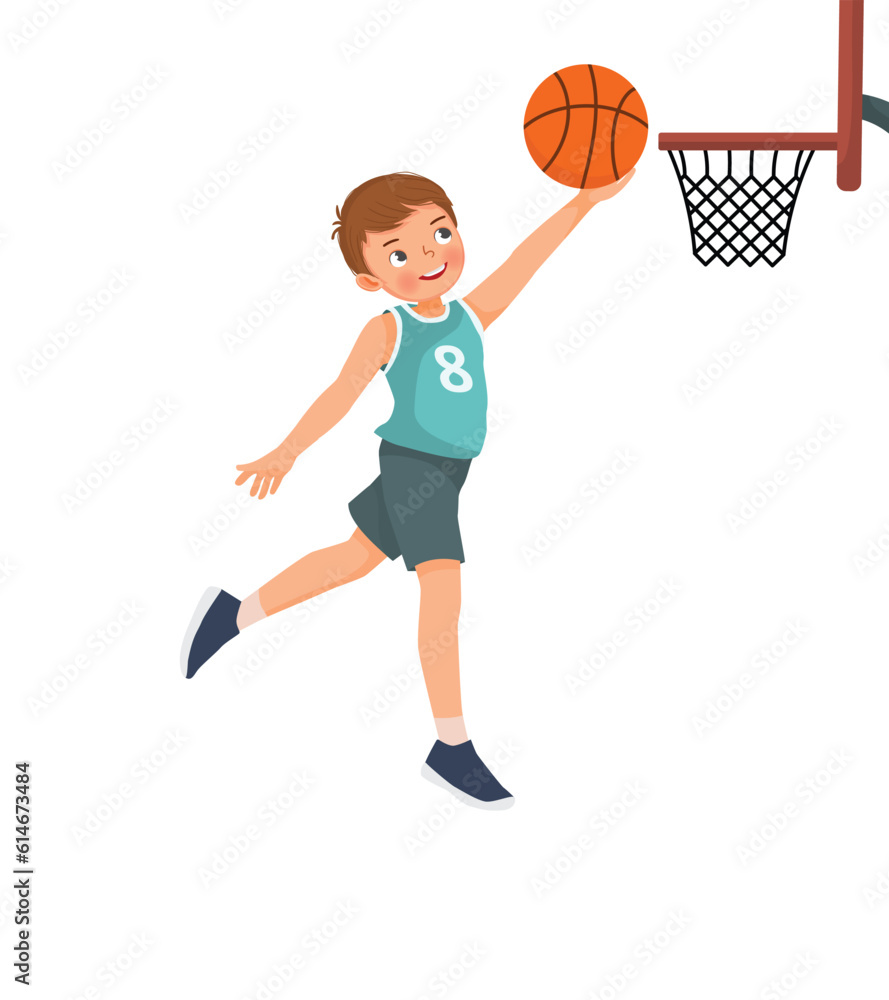 Cute little boy jumping scoring a layup at basketball game Cute little boy jumping scoring a layup at basketball game