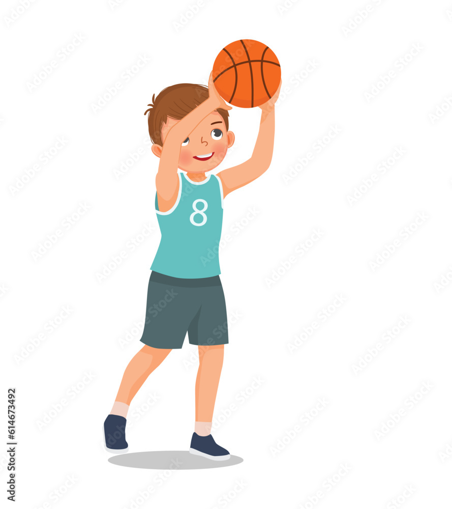 Cute little boy ready to shoot basketball at the rim Cute little boy ready to shoot basketball at the rim