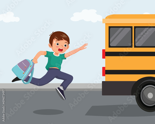 Cute little boy chasing after the school bus running late to school
