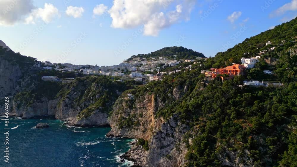 Breathtaking Scenic View Of Buildings And Village On Top Of Cliff Rocks At The Island Of Capri In Italy. aerial Breathtaking Scenic View Of Buildings And Village On Top Of Cliff Rocks At The Island Of Capri In Italy. aerial