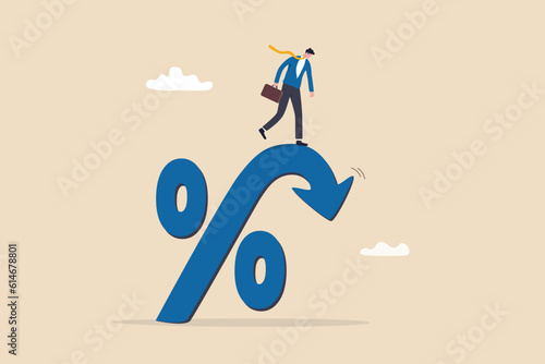 Inflation or interest rate falling down, decrease or reduction, profit fall in economic recession, stock market value loss, FED reduce interest rate, businessman on percentage sign with falling down.