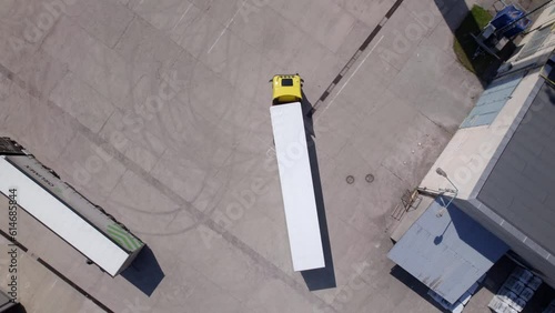 Top down view of the the loaded truck leaves the production area