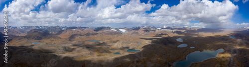 panoramic photo of the high-mountain lake Ak-Kul in Kyrgyzstan, Kyrgyzstan. Beauty from a bird's-eye view, drone.