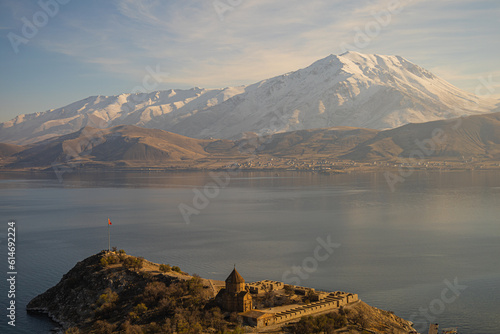 An old church and holy mountain in Lake Van, Turkey photo