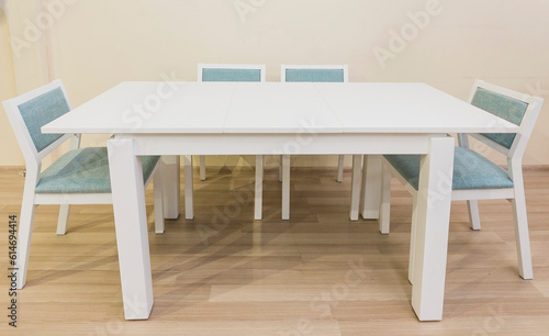 White table with four chairs, furniture design