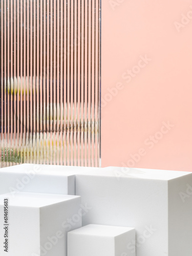Fototapeta Naklejka Na Ścianę i Meble -  White block pedestal product display peach background with modern Transparency strip glass  and flower with sunshine light