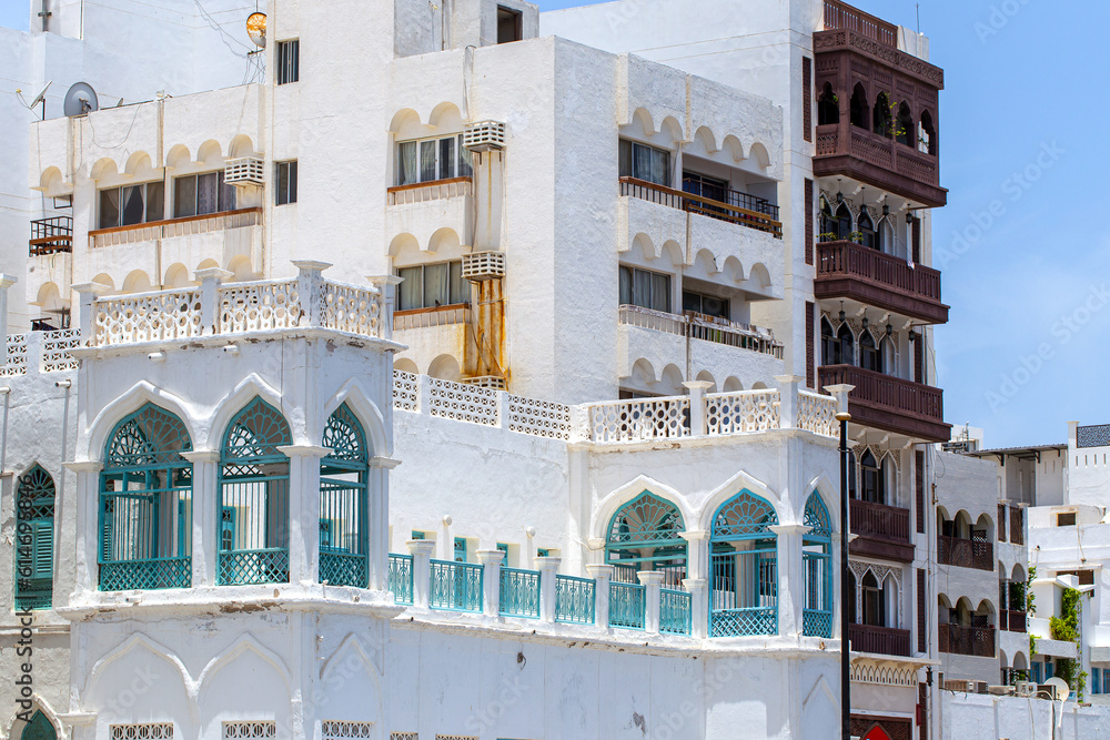 Traditional white houses with balconies and terraces in Muscat. Sultanate of Oman