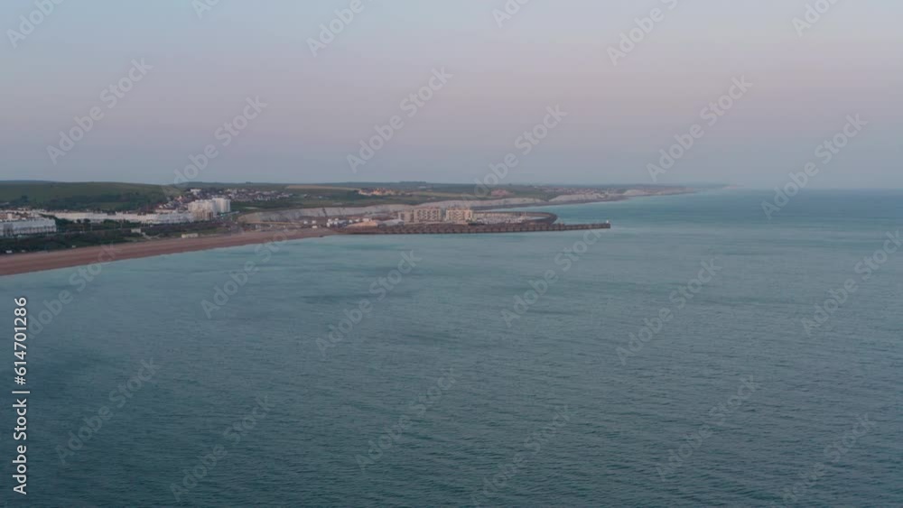 Descending aerial shot over Brighton Marina and Seven Sisters cliffs Descending aerial shot over Brighton Marina and Seven Sisters cliffs