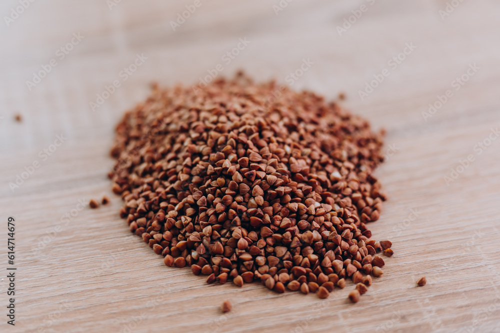 Raw buckwheat on the table before preparing dinner Raw buckwheat on the table before preparing dinner