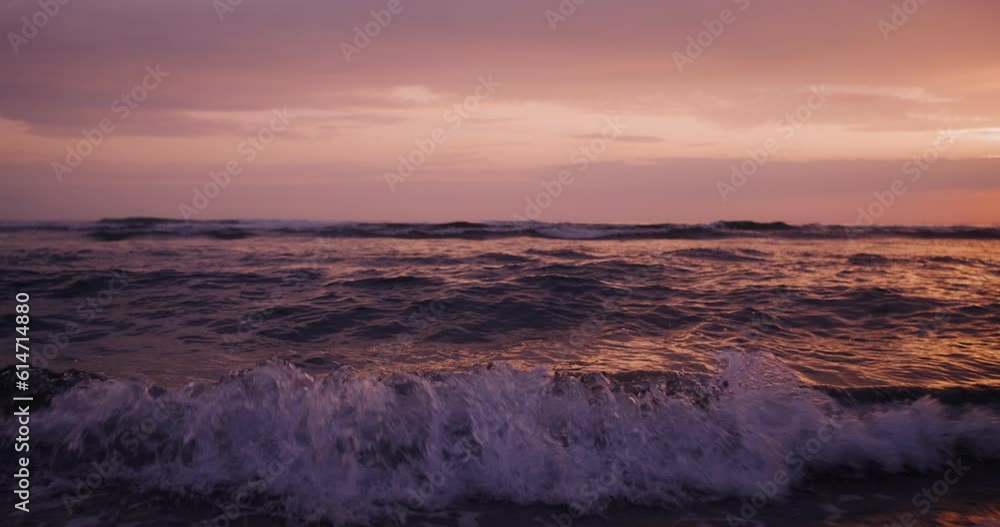 Foamy sea waves in the rays of the setting sun, sea water without land Foamy sea waves in the rays of the setting sun, sea water without land