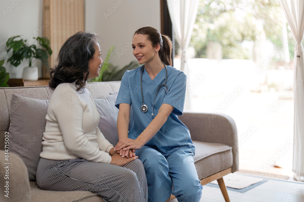 caregiver with senior woman and holding hands for care indoors. Retirement, consulting and professional female nurse with elderly person smiling together for healthcare support at nursing home caregiver with senior woman and holding hands for care indoors. Retirement, consulting and professional female nurse with elderly person smiling together for healthcare support at nursing home