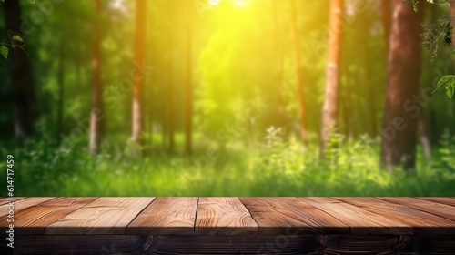 Forest wooden table background. Summer sunny meadow with green grass, forest trees background and rustic wooden surface for goods, products, food