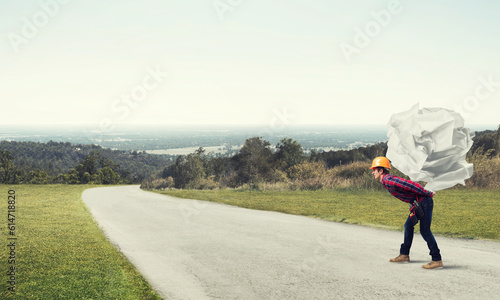 Wallpaper Mural Engineer man carry load Torontodigital.ca
