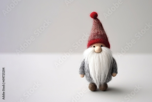 Soft toy cute Swedish Scandinavian folklore Christmas gnome nisse, tomte, with a big red hat and white beard, in the style of Danish design, with christmas background. Copy space. 